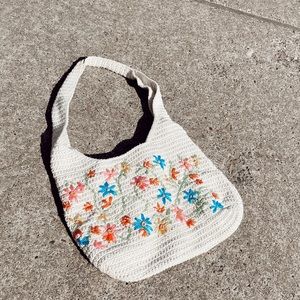 Cute, trendy crochet bag with flowers embroidered